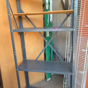 heavy-duty storage unit is a Tennsco boltless steel industrial shelving unit