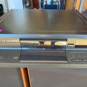vintage stereo component is a Sony CDP-CE105 5-Disc Carousel CD Changer.