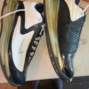 Size 11 vintage Nike Air Max Griffey Jr. Swingman sneakers in a black and white colorway with yellow