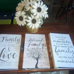 Photo Albums (3) and faux flower arrangement
