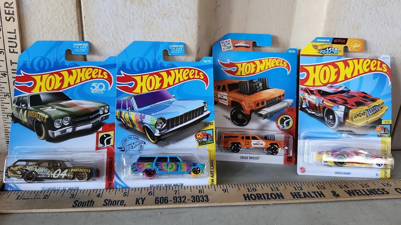 4 Assorted Hot Wheels