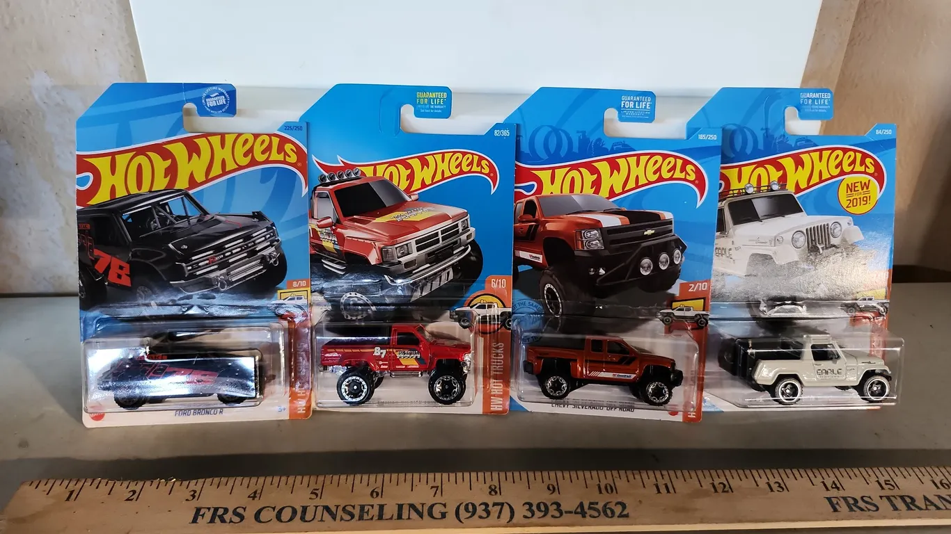 4 Assorted Hot Wheels