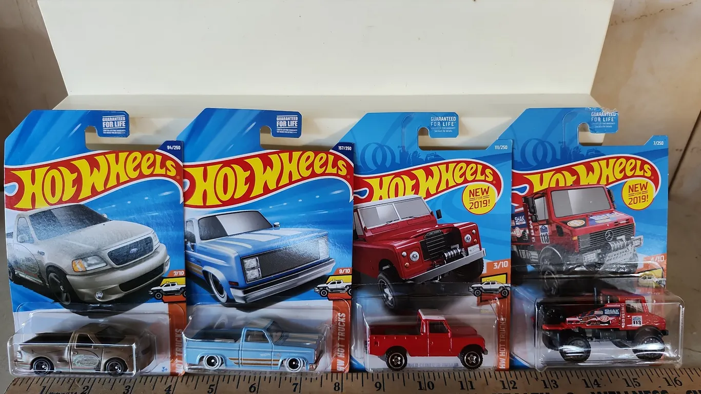 4 Assorted Hot Wheels