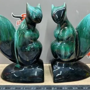 8” Pottery Squirrel Book Hands.