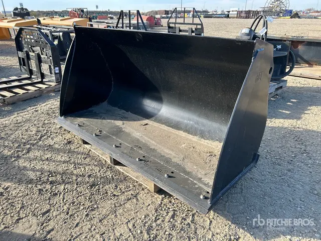 Cat 74 in Skid Steer Bucket