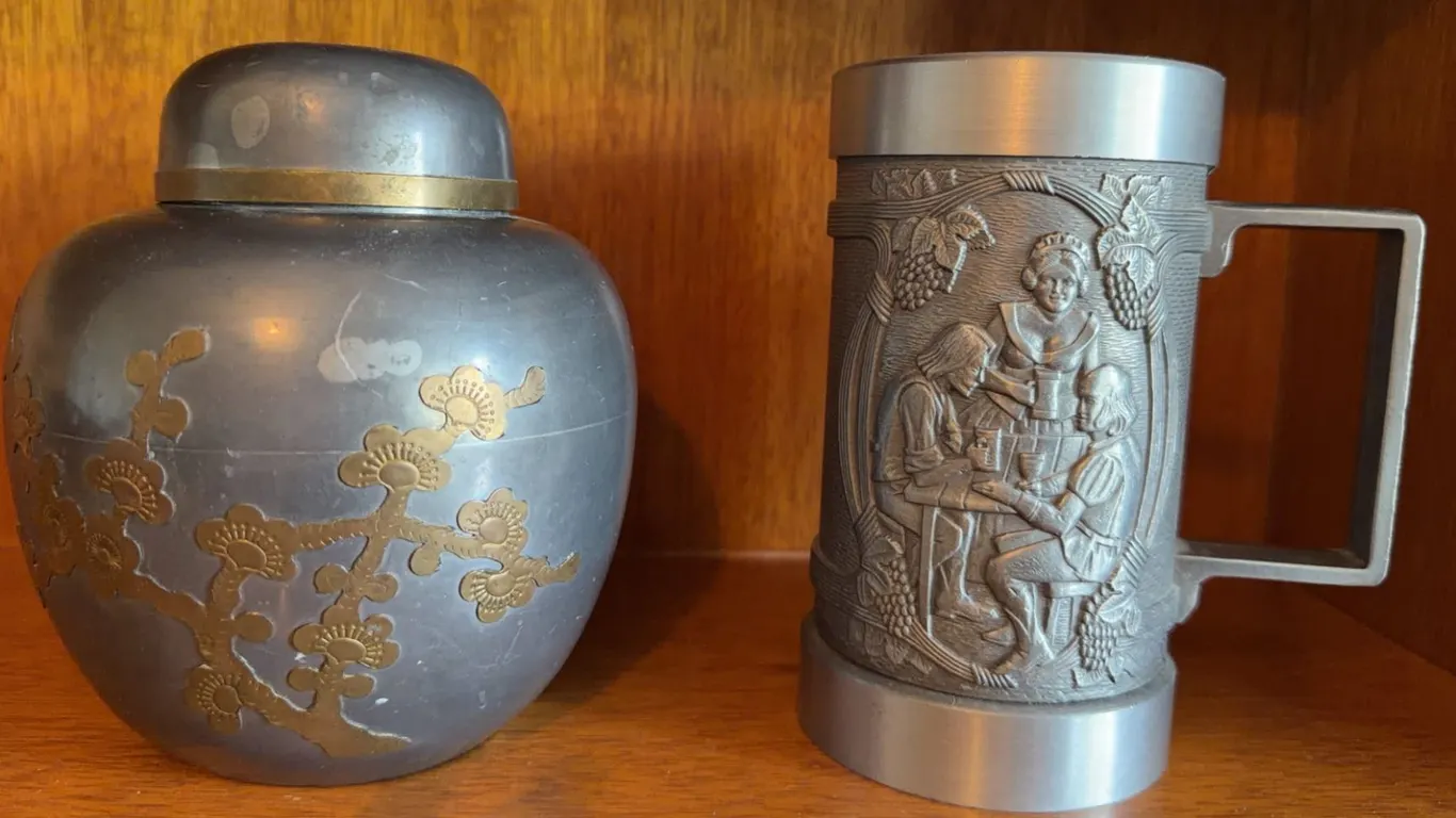 Metal Decorative Items: Lidded Floral Jar and Figural Relief Stein
