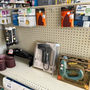 Assorted Sandpaper and Electric Brad Nail Guns