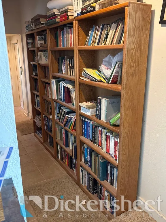 THREE TALL BOOK CASES