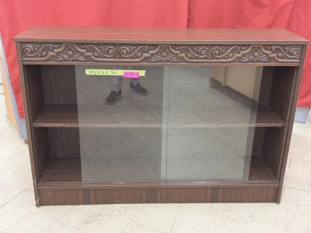 Dark wood display cabinet