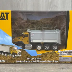 Caterpillar CT660 Day Cab W/OX Stampede Dump Truck, 1/64