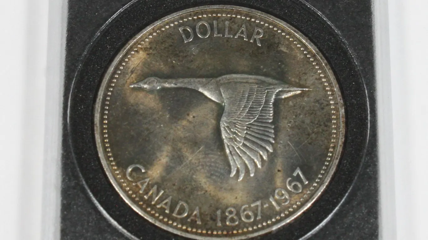 1967 CANADA SILVER DOLLAR SOME BLUE NATURAL