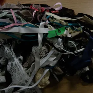 UNCLAIMED STORAGE:  1 CU FT RUBBERMAID TOTE & LID C/W ASSORTED SEWING MATERIAL