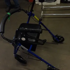 BLUE WALKER WITH BRAKES AND STEERING WHEELS