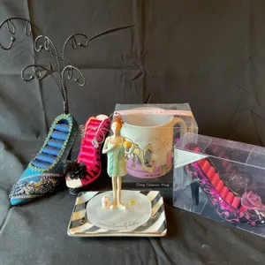 Decorative Items Including Miniature Shoes, Mug, Figurine, and Tray