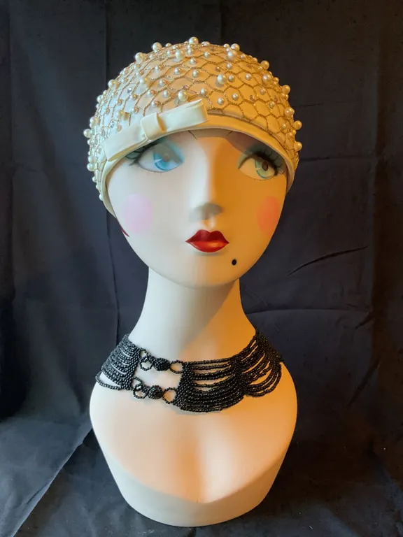 Pearl-Embellished Cap, Mannequin Head, and Black Beaded Necklace Display Set