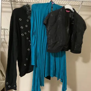 Three Women’s Tops Featuring BCBGirls, INC, and Contucci Designs