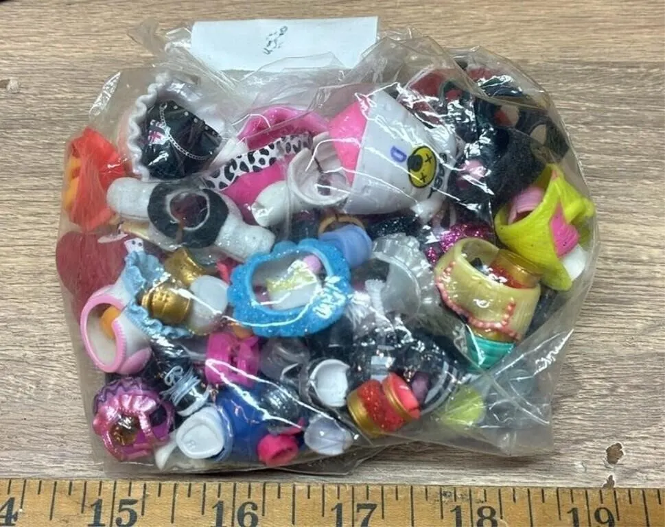 Bag of LOL Surprise Doll Accessories.