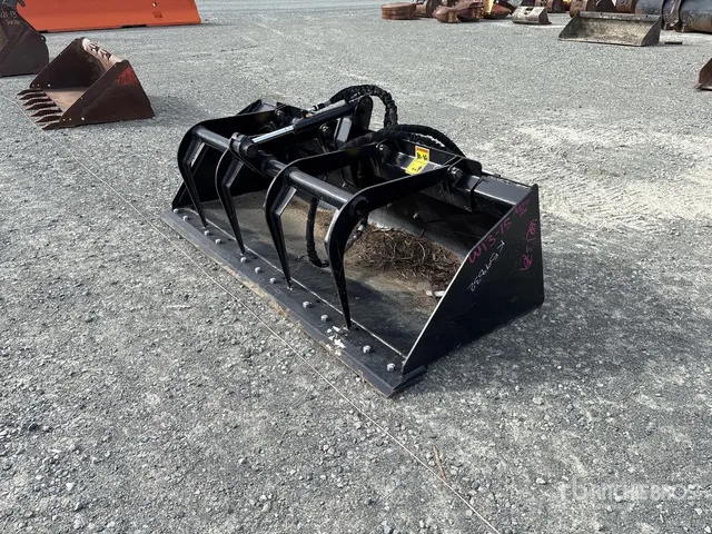 Cat 74 in Skid Steer Grapple Bucket