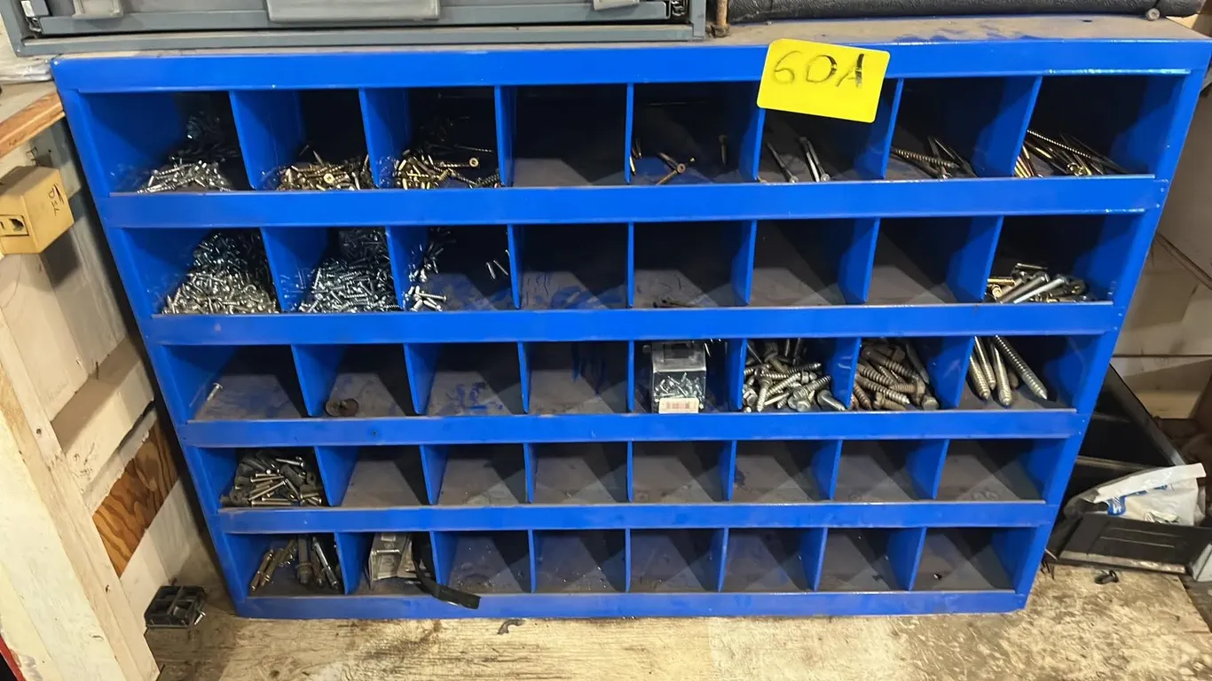 Blue parts bin with screws