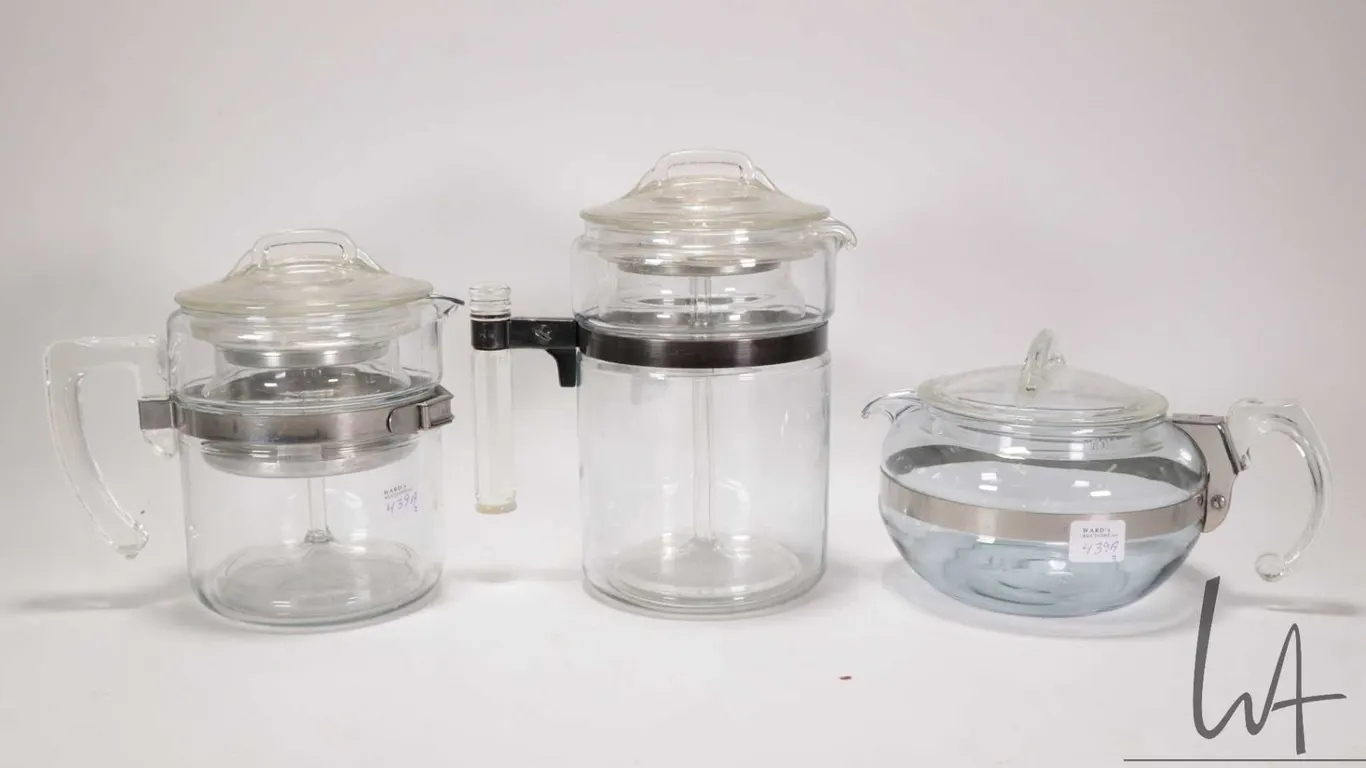 Two vintage Pyrex coffee perculators and a Pyrex tea pot