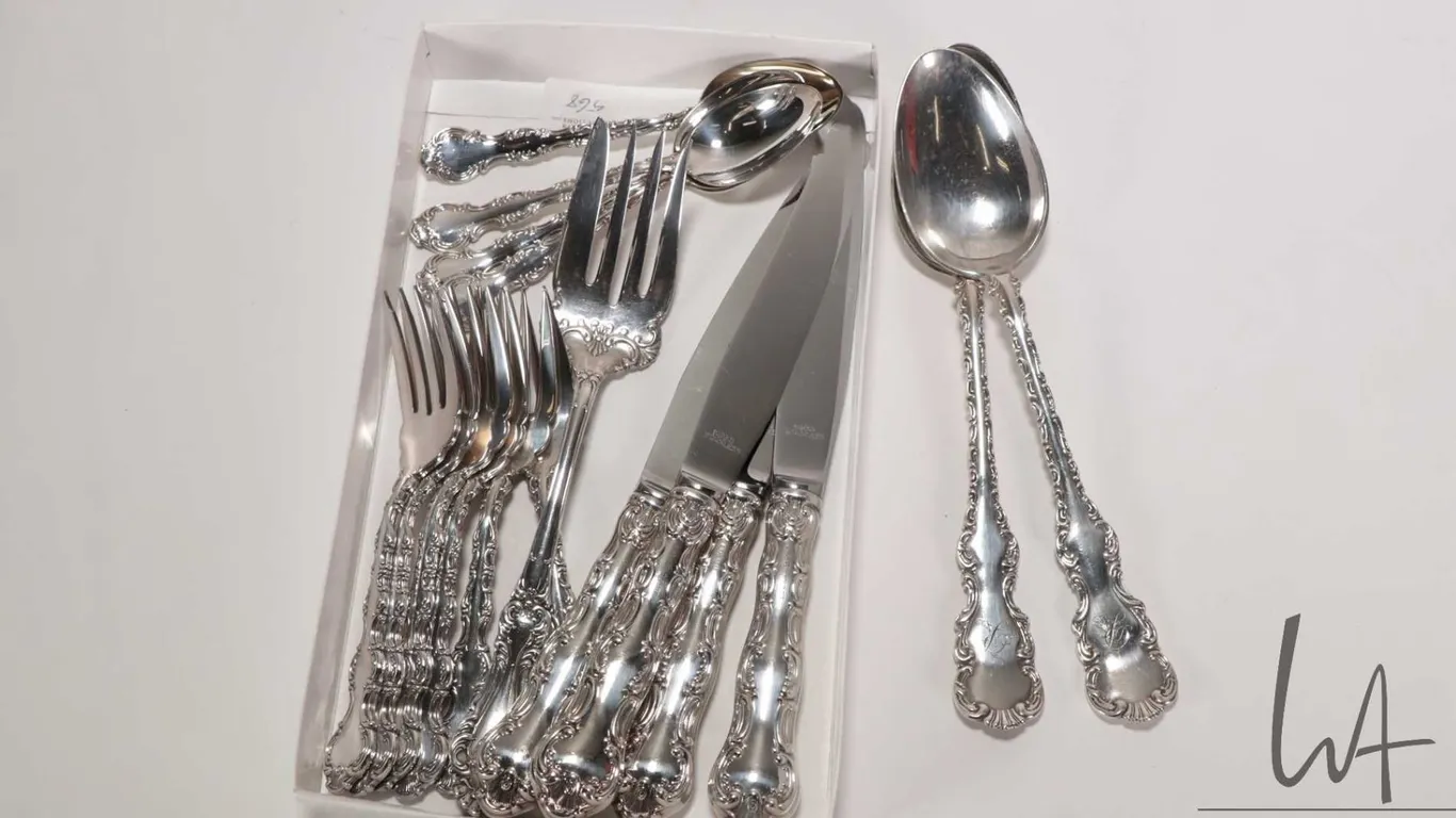 Selection of Birks Regency silver-plate flatware including four table knives, two serving spoons, se