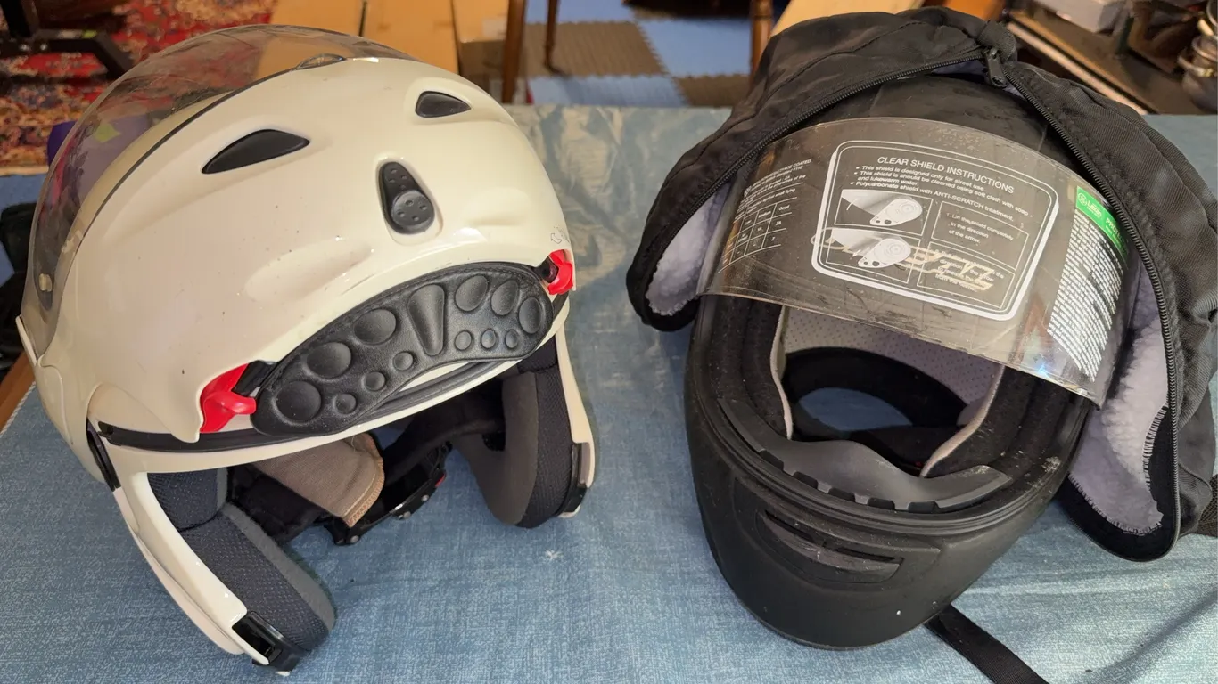 Pair of motor cycle helmets