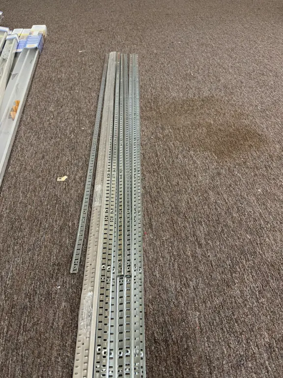 Metal brackets for shelving