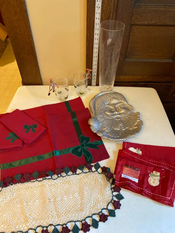 Christmas-Themed Items Including Textiles, Glassware, and Bakeware