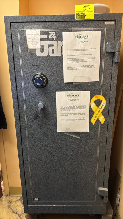 Gardall combination safe. Features Sargent & Greenleaf mechanical dial lock, L-handle, and adjustable interior shelving. Includes combination. Dimensi