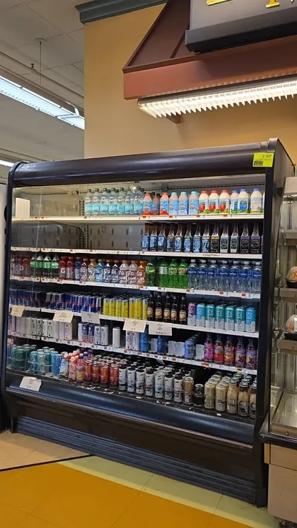 Hillphoenix O5DM6 upright multi-deck open display case. Features solid adjustable shelving and interior lighting. 6'L. S/N: 817582. Electrical: 120V,