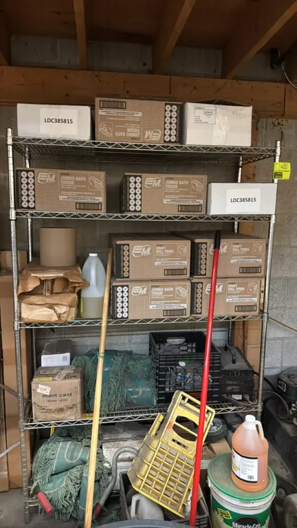 Multi-tier wire shelving rack. Features 5 adjustable wire shelves and metal post construction. 48" x 20" x 72". Contents not included.