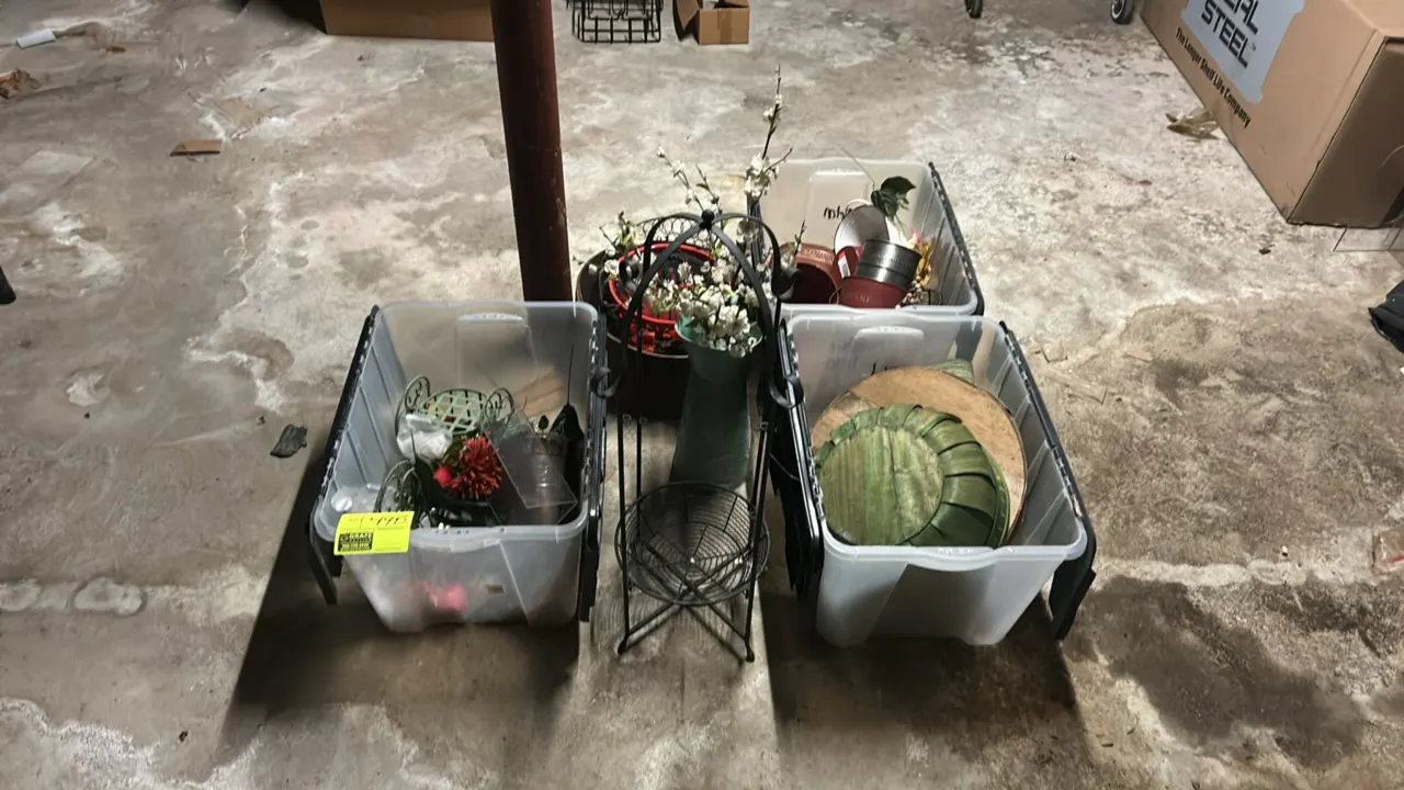 Assorted fall and seasonal decorations. Includes black metal wire plant stand, woven baskets, decorative metal pails and tins, faux floral stems and f