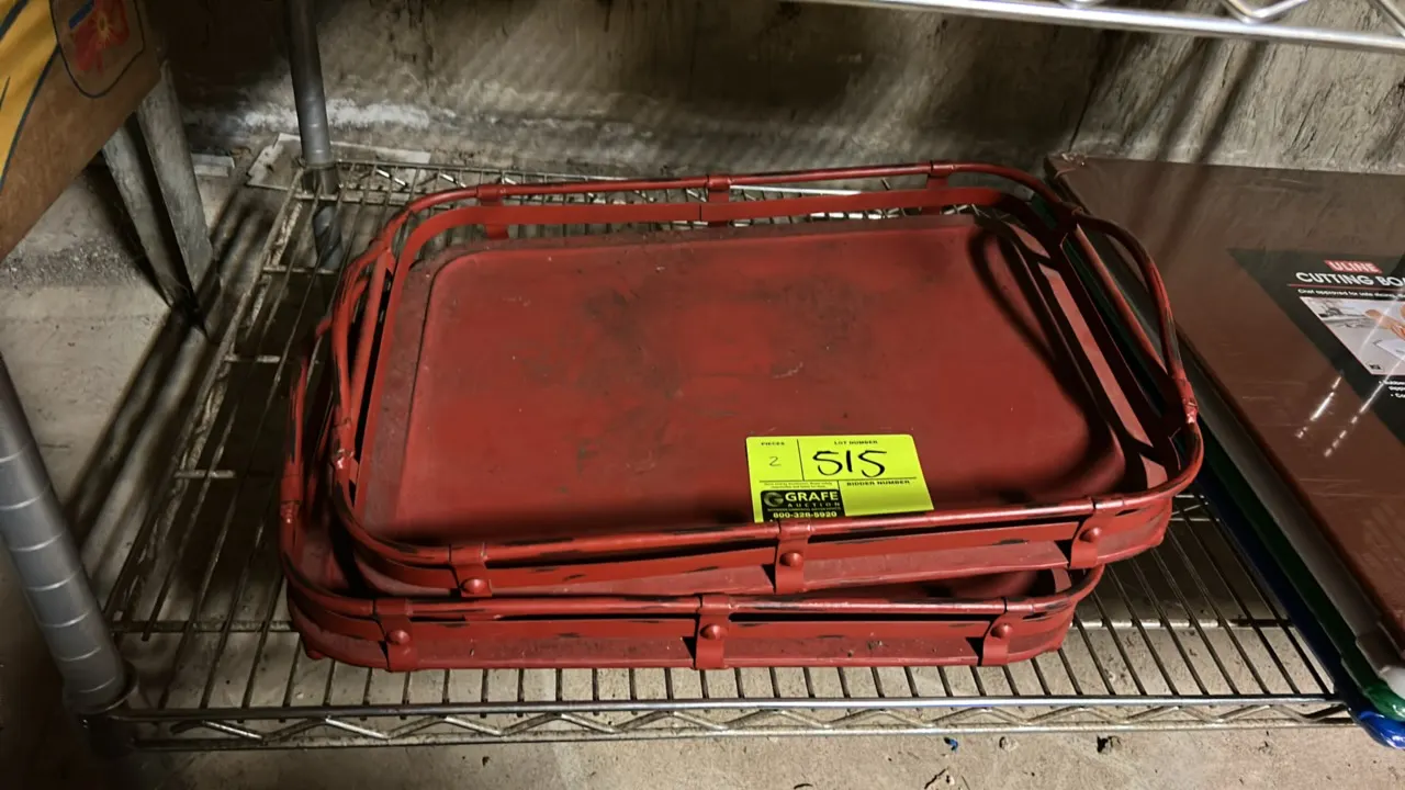 Metal baskets. Features red painted finish, raised rail frame, integrated side carry handles, and solid base. 19".