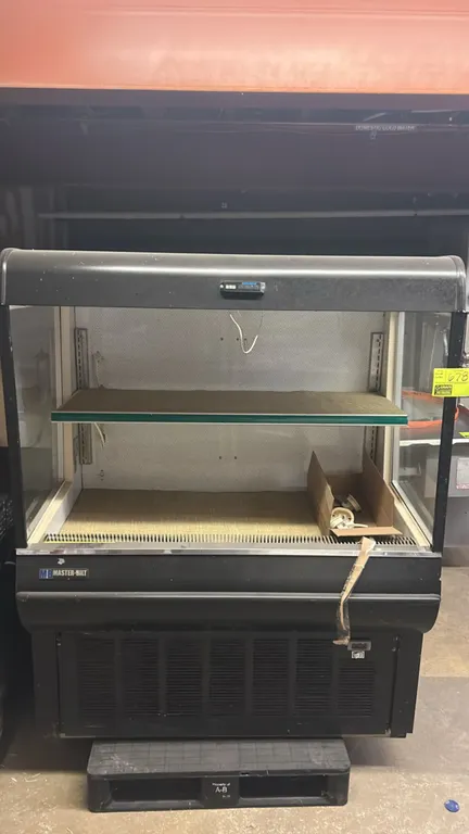 Master-Bilt QMVM-48L self-contained open refrigerated grab and go display case. Features glass side panels, single adjustable shelf, and digital therm