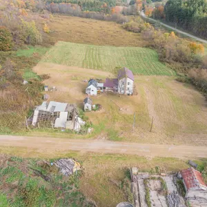 Parcel 1: Older Home and Outbuildings on 6.9 Acres