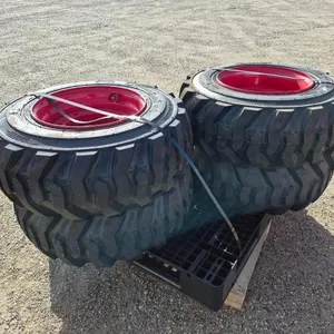 (4) Beaver 12-16.5 NHS Tires w/ Rims
 UNRESERVED