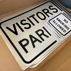 No Smoking Stickers with Visitor Parking Signs