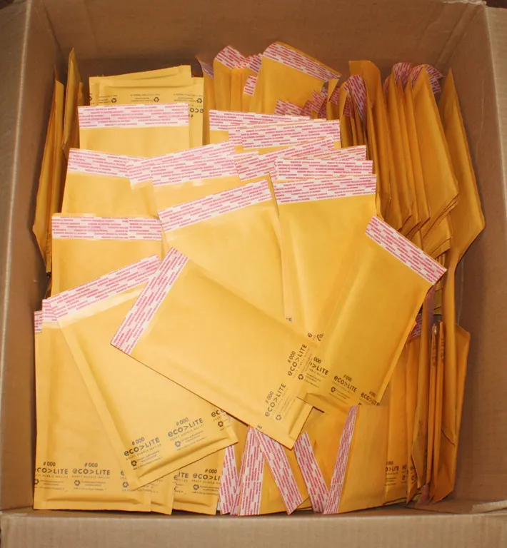 HALF FULL BOX OF BUBBLE MAILERS SIZE SIZES 8"X5"