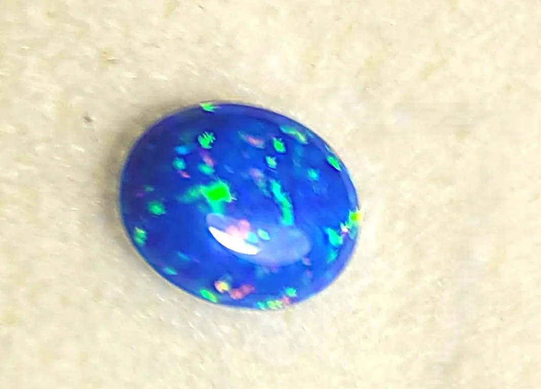 4) NATURAL .05 CT OVAL BLUE