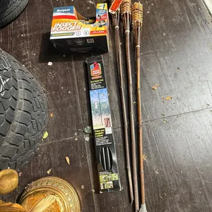 (3) Tiki Torches, Insect Fogger, (2) Bottles of Fog