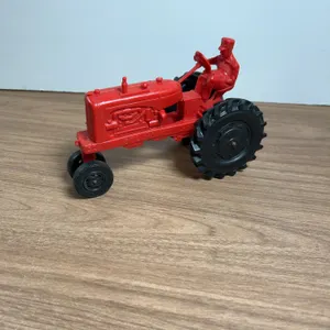 Auburn Rubber Red Plastic Toy Tractor with Driver Figure