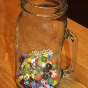 Glass Jug With Assorted Glass Marbles Collection