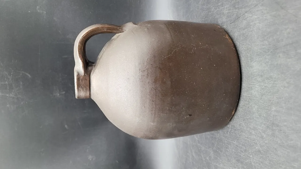 BROWN STONEWARE JUG
