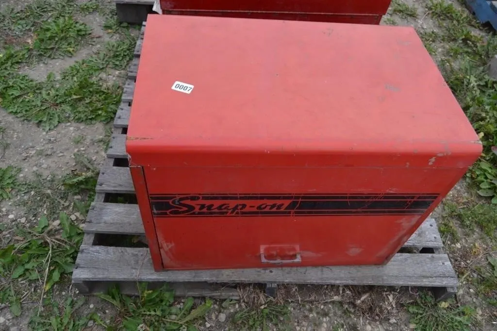 Sanp on tool box with assortment of tools