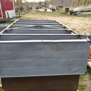 Three metal shelving units
