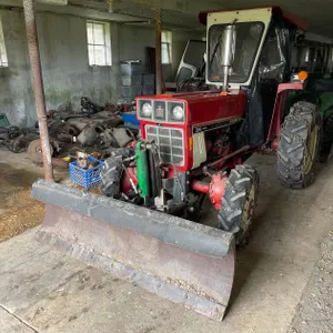 International 284 Diesel Tractor with Plow