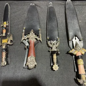 4 Decorative Fantasy Daggers with Sheaths and Ornate Handles