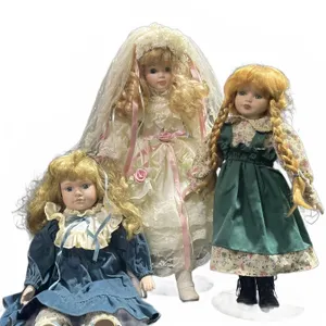 Three Porcelain Dolls: 18" White, 15" Green, 15" Blue Dress With Blonde Hair