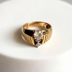 Lady's 14K Yellow Gold Ring With Three Diamonds and Ribbed Design