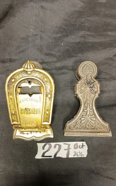 (1) Cast Iron and (1) Brass Victorian Paper Clips